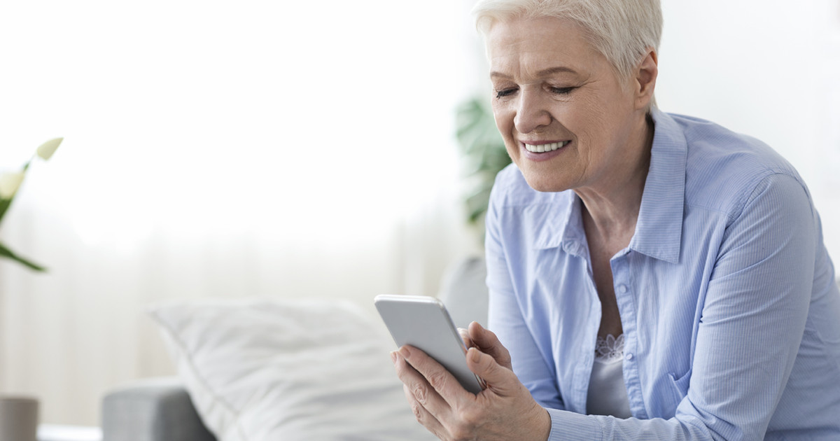 woman looking at phone